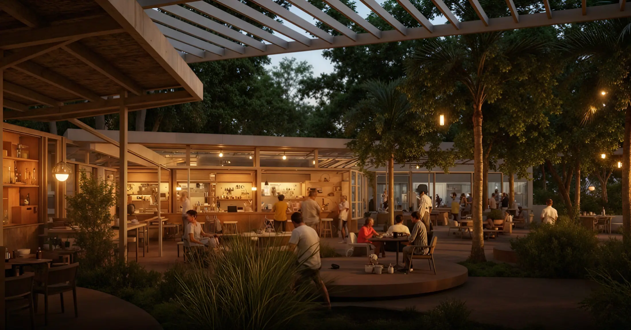 Por la noche, la gente cena y se relaja en un restaurante al aire libre, rodeado de árboles, vegetación y una cálida iluminación. El entorno es moderno, con pérgolas y un ambiente acogedor.